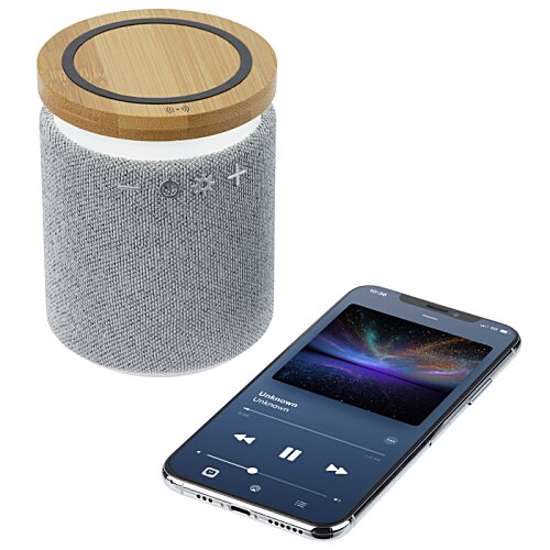 Additional Image 4 - a bluetooth speaker next to a cell phone