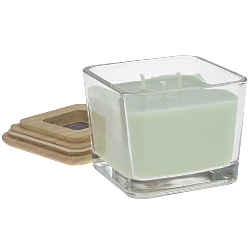 Additional Image 1 - a glass candle with a white liquid in it