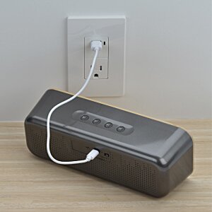 Additional Image 5 - a black rectangular object with a white cord plugged into a wall