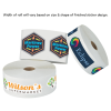 rolls of white paper with colorful stickers