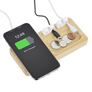 Additional Image 3 - a phone charging on a wood board