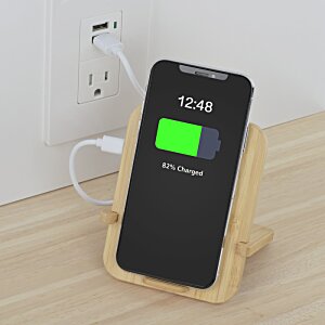 Additional Image 5 - a phone charging on a charging station