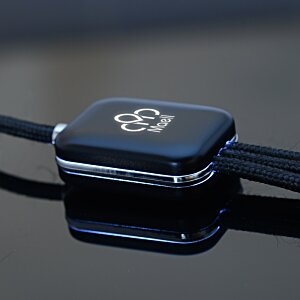 Additional Image 4 - a black square object with a black cord