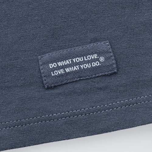 Additional Image 3 - a label on a blue shirt