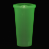 a green plastic cup on a black background