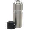 a silver thermos with a black cap