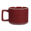 a red mug with a handle