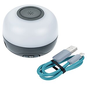 Additional Image 1 - a round object with a round black button and a blue cord