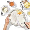 a person mixing food in a bowl