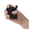 a hand holding a black object