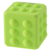 a green toy cube with holes