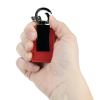 a hand holding a red lighter