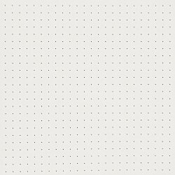 a white surface with small dots