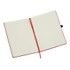 a white notebook with red band