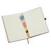 a white book with a colorful bookmark