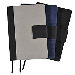 a group of notebooks with straps