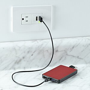 Additional Image 3 - a red device plugged into a wall outlet
