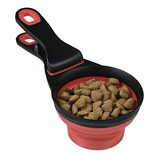 Additional Image 4 - a red and black measuring cup with food in it