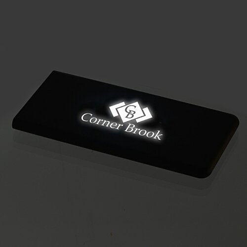 Additional Image 6 - a black rectangular object with white text