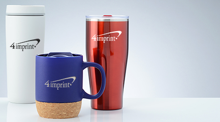 Promotional drinkware products that include a cork bottom mug, travel tumbler and vacuum tumbler