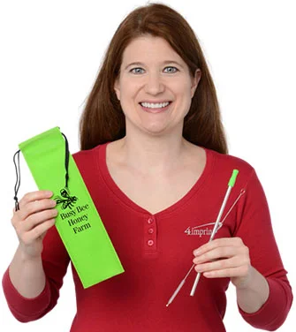 4imprint employee Jennifer holding the Stainless Steel Straw Set