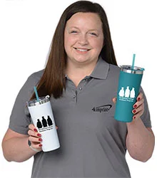 4imprint employee Callie holding two Colma Vacuum Tumblers with Straw