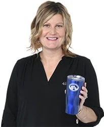 4imprint employee Carrie holding the Victor Vacuum Tumbler