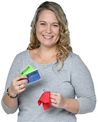 4imprint employee Lori holding the Cleaning Cloth in Printed Pouch