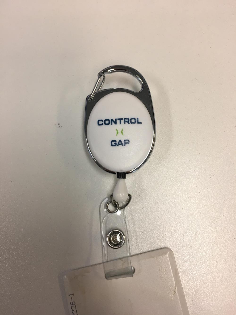 a white and blue retractable keychain