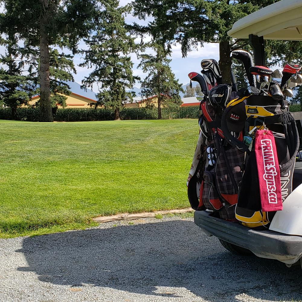 a golf bag in the back of a golf cart