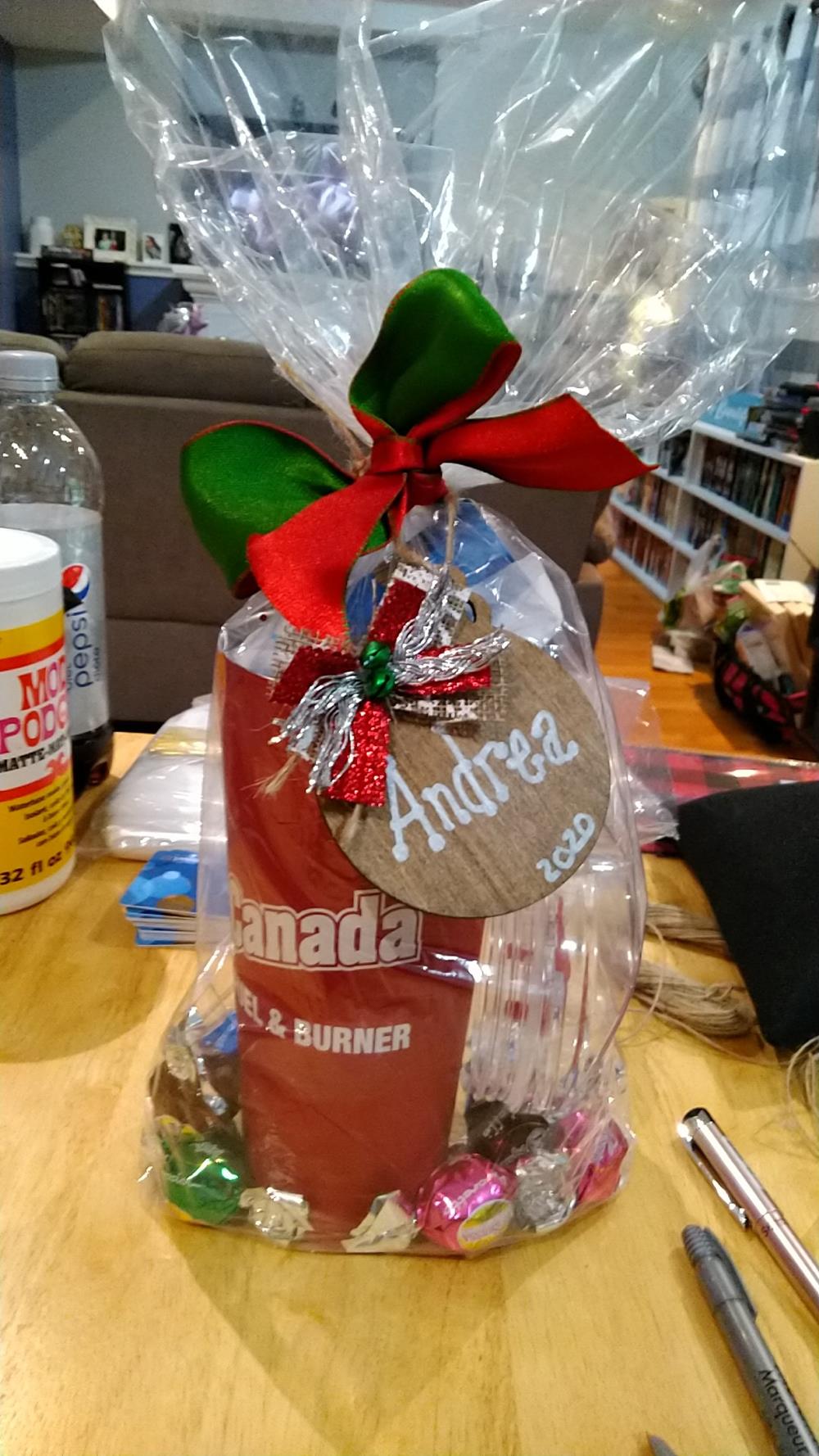 a gift bag with a bow and ribbon