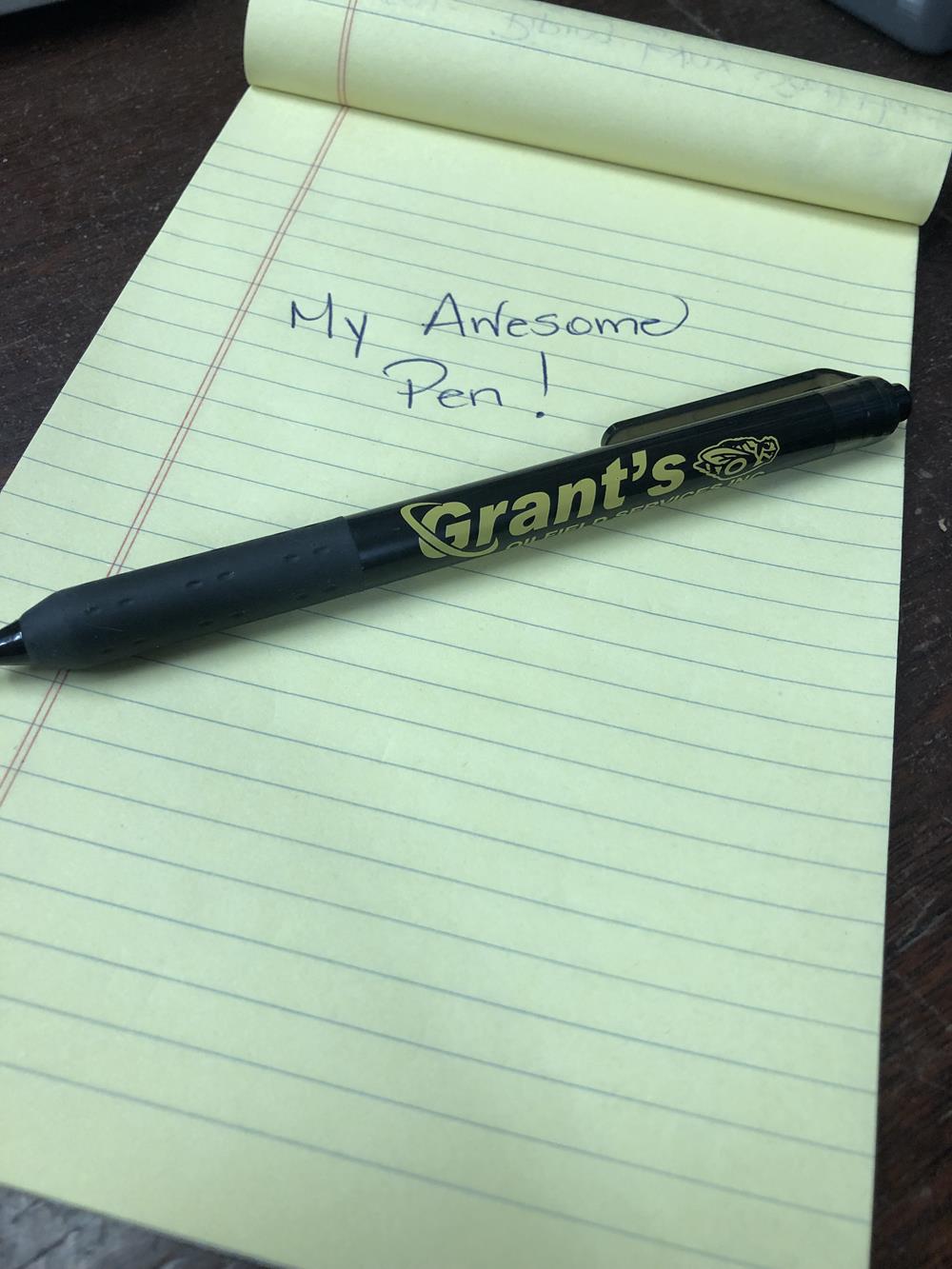 a pen on a notepad