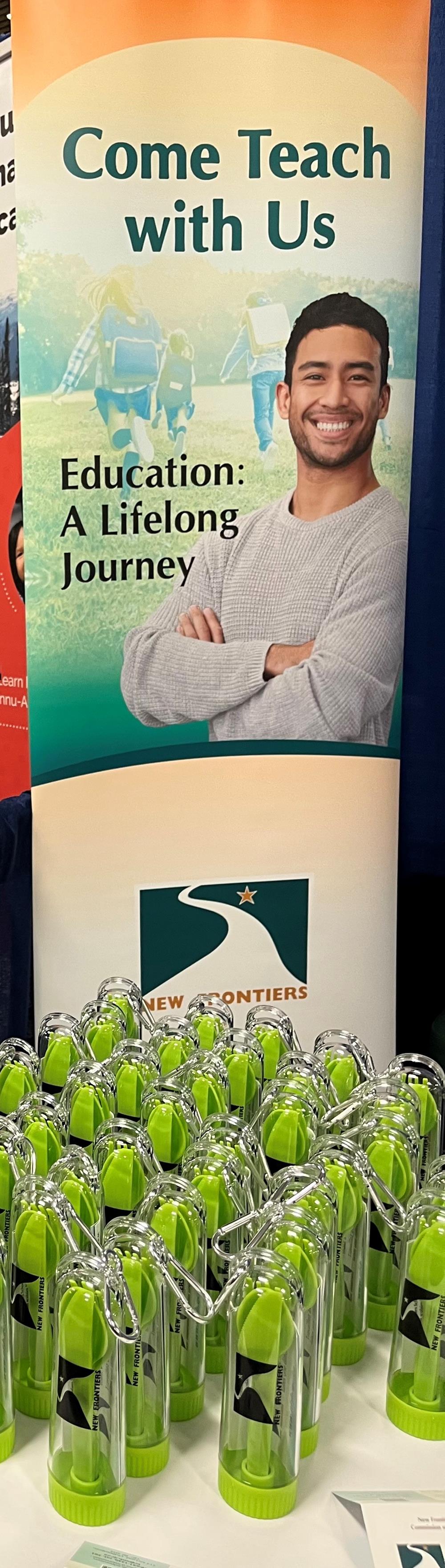Customer photo from Kim of our Economy Retractable Banner Display - 24 inches, a man standing on a book cover