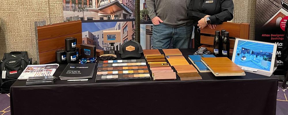 Customer photo from Brittany of our Moleskine Volant Ruled Notebook - 8 1/4 inches x 5 inches - Debossed, a table with a variety of wood samples