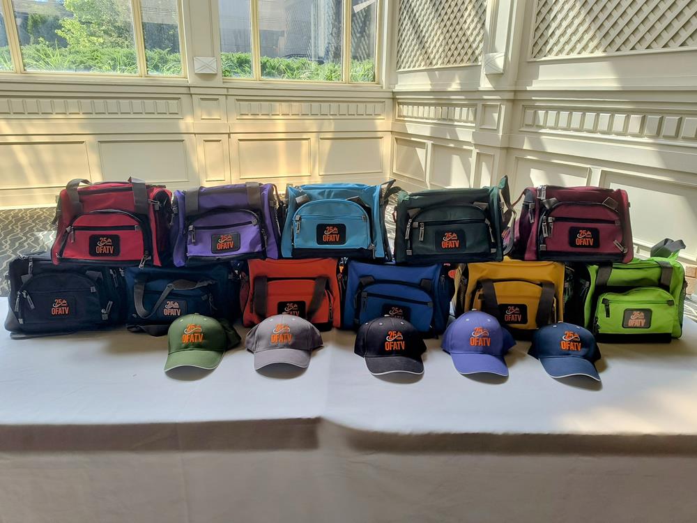 a group of bags and hats on a table