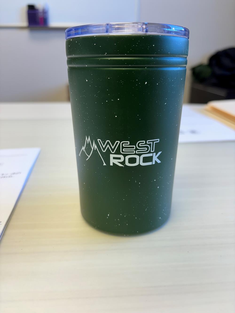 Customer photo from Kathy of our Sherpa Vacuum Travel Tumbler and Insulator - 11 oz. - Speckled - Closeout, a green cup on a table