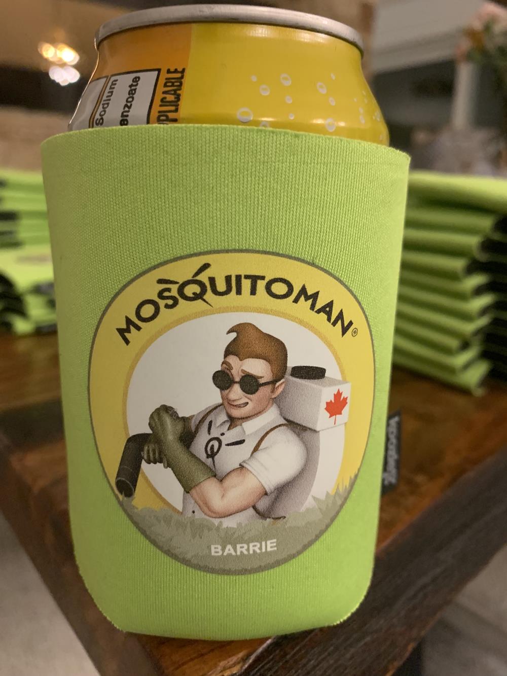 Customer photo from Earl of our Collapsible Koozie®, a green can with a cartoon character on it