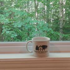 a mug on a window sill