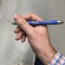 Customer photo from Corey of our Alamo Soft Touch Metal Pen, a hand holding a pen