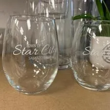 Customer photo from Crystal of our Sardinia Stemless Wine Glass - 15 oz., a group of glasses on a table