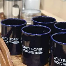 Customer photo from Lisa of our Value Coffee Mug - 11 oz. - Colours, a group of blue mugs on a wooden tray