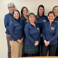 Customer photo from Florence of our Express Tech Performance 1/4-Zip - Ladies', a group of women in blue shirts
