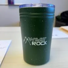 Customer photo from Kathy of our Sherpa Vacuum Travel Tumbler and Insulator - 11 oz. - Speckled - Closeout, a green cup on a table
