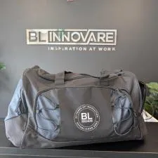 Customer photo from Deonic of our Diamond Rock Duffel, a black duffel bag on a table
