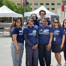 Customer photo from Alicia of our Knox Keychain with Phone Holder, a group of women wearing matching shirts