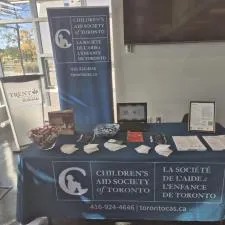 Customer photo from Krupa of our TaskRight Sticky Pad -  3" x 4" - 50 Sheet, a table with a blue tablecloth and a sign