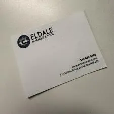 Customer photo from Rythum of our Sticker by the Roll - Rectangle - 3" x 5", a white business card with black text and blue logo