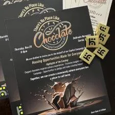 Customer photo from diane of our Dark Chocolate Mint Thins, a group of black and gold flyers